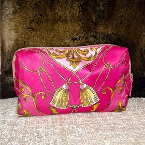 Estee Lauder cosmetic bag ideal for travel in pink